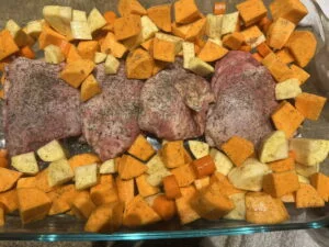 Easy Pomegranate Chicken Recipe with Honey Glaze and Root Vegetables 4 Chicken Thigh Prep in Pan